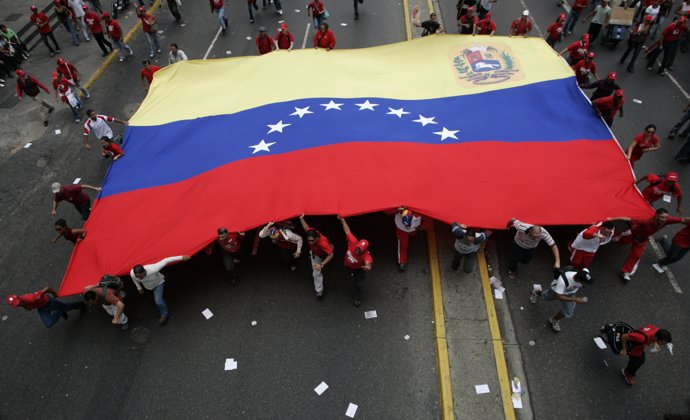 Supporters of Venezuela's President Hugo Chavez take part in a march to support 