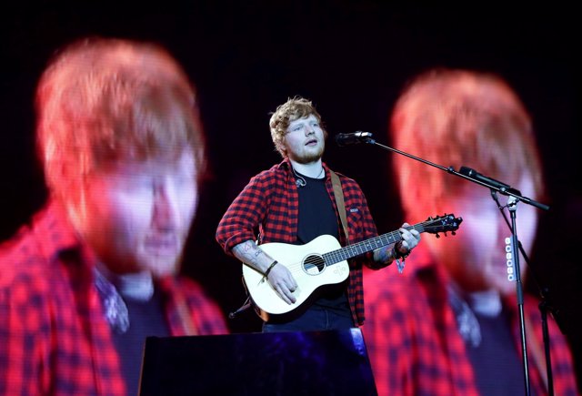 Ed Sheeran performing on the Pyramid stage at Glastonbury Festival, at Worthy Fa