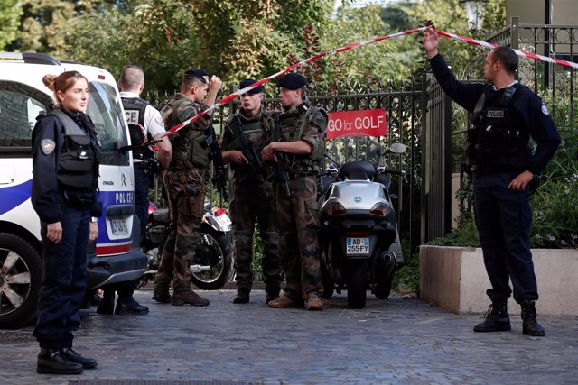 Police work near the scene where French soliders were hit and injured by a vehic