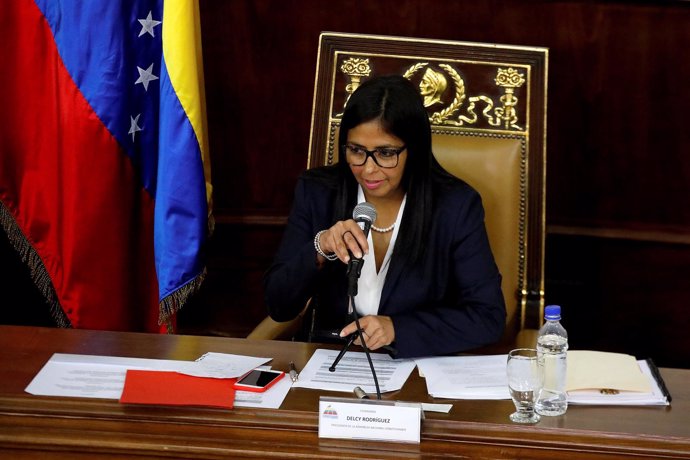 FILE PHOTO: National Constituent Assembly President Delcy Rodriguez attends to o