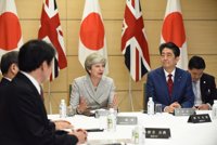 May y Abe acuerdan cooperar para hacer frente al desafío de Corea del Norte