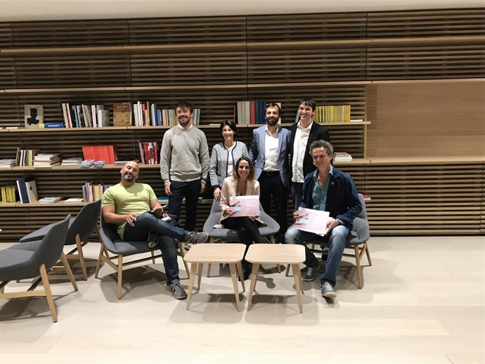 Premiados y participantes en el coloquio