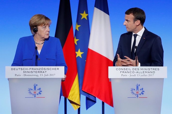 Merkel y Macron en la reunión anual en París