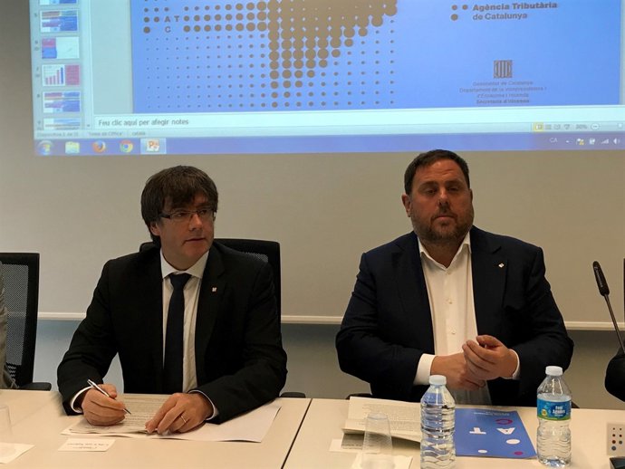 El president de la Generalitat,  Carles Puigdemont i Oriol Junqueras