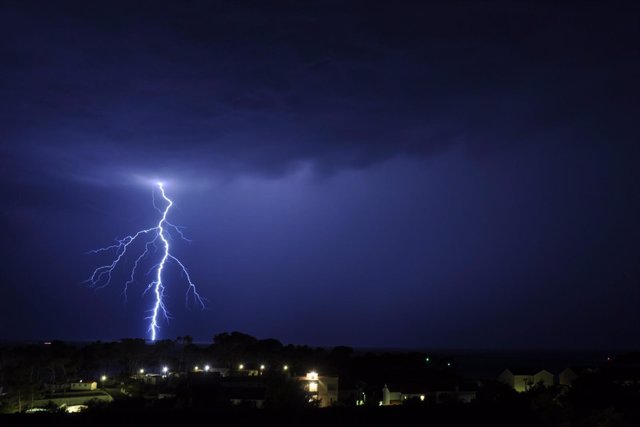  07.08.2017., Rab Island, Croatia - Lightning Connected Sea And Sky Obove City O