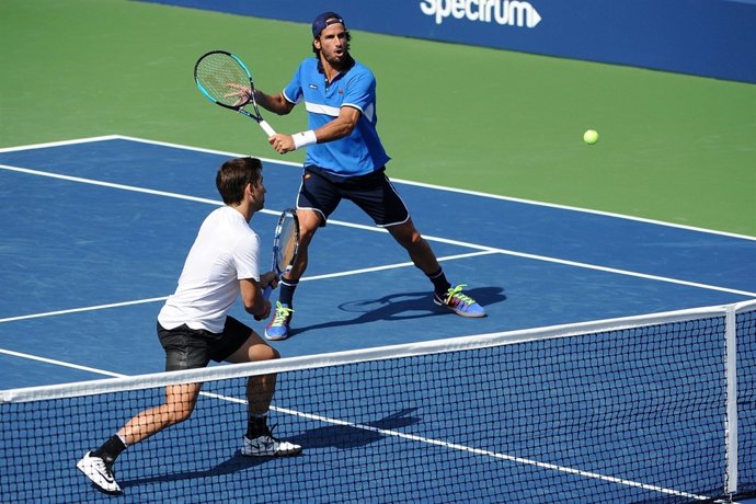 Feliciano y Marc López en una acción del partido