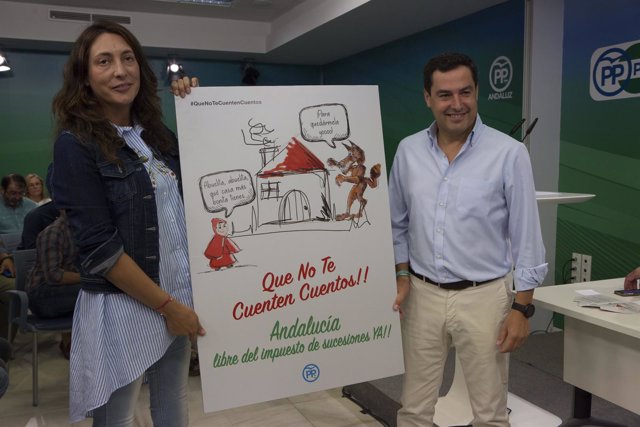 Juanma Moreno y Loles López, hoy con el cartel de la campaña