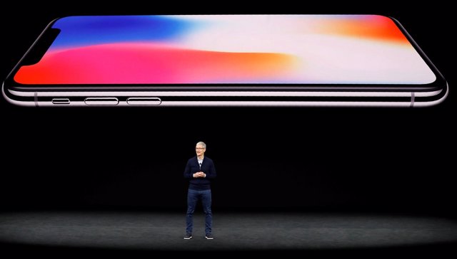 Tim Cook, CEO of Apple, speaks about the iPhone X during a launch event in Cuper