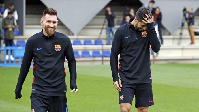 Lionel Messi y Luis Suárez en un entrenamiento del Barcelona