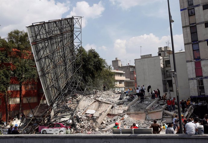 A collapsed building is seen after an earthquake in Mexico City, Mexico Septembe