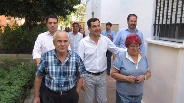 Juanma Moreno con José María Bellido y Adolfo Molina