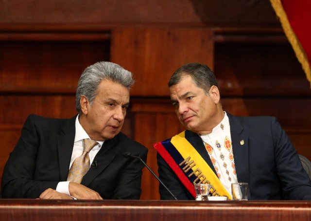 Ecuador's President-elect Lenin Moreno (L) and President Rafael Correa sit toget