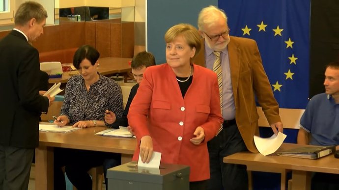 Las encuestas a pie de urna dan la victoria a Merkel