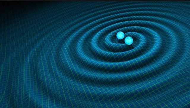 Dos agujeros negros en fusión produciendo ondas gravitacionales
