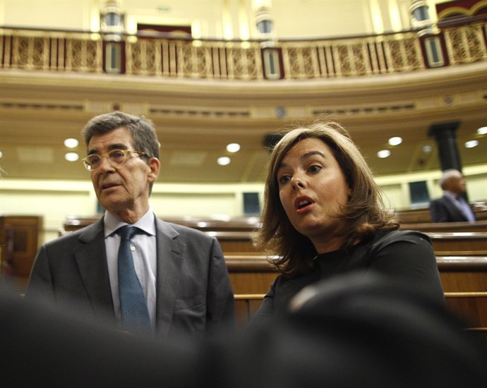 Soraya Sáenz de Santamaría i José Enrique Serrano