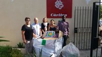 Cáritas recibe 150 kilos de juguetes recogidos por el camión de reciclaje de Emaya