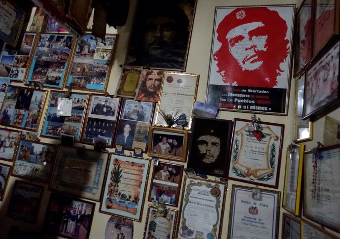 A wall decorated with images of Ernesto "Che" Guevara is seen at the home of a r