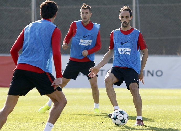 Juanfran y Gabi entrenando con el Atlético