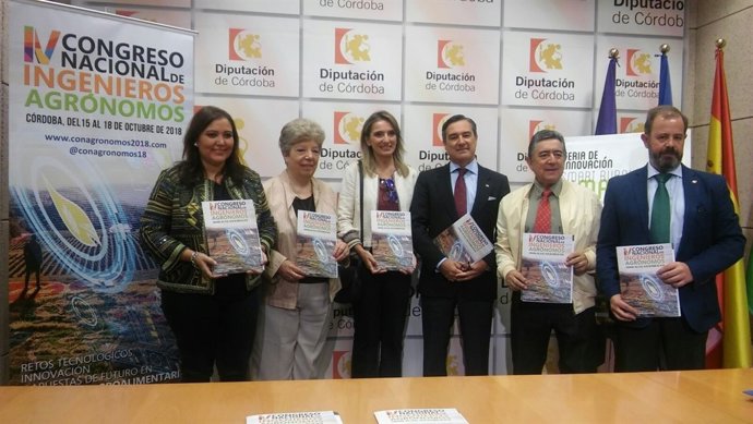 Carrillo (izda.) en la presentación del congreso