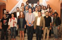 El pleno apoya a la plantilla de Arvato y pide a la empresa que renuncie a cerrar su plataforma de Sevilla Este