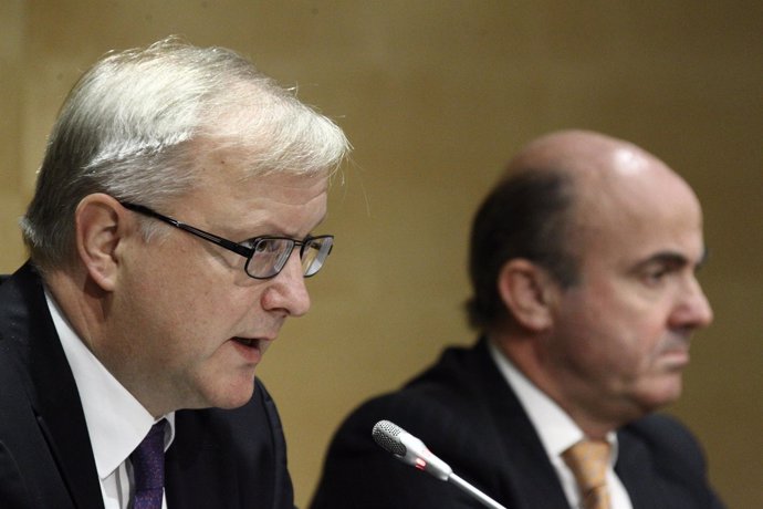 Olli Rehn y Luis De Guindos