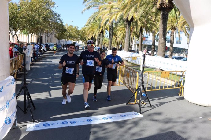 Participantes en carrera solidaria en Huelva