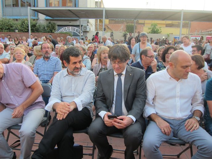 El pte.de l'ANC J.Sànchez, el pte.C.Puigdemont i l'exconseller X.Vendrell