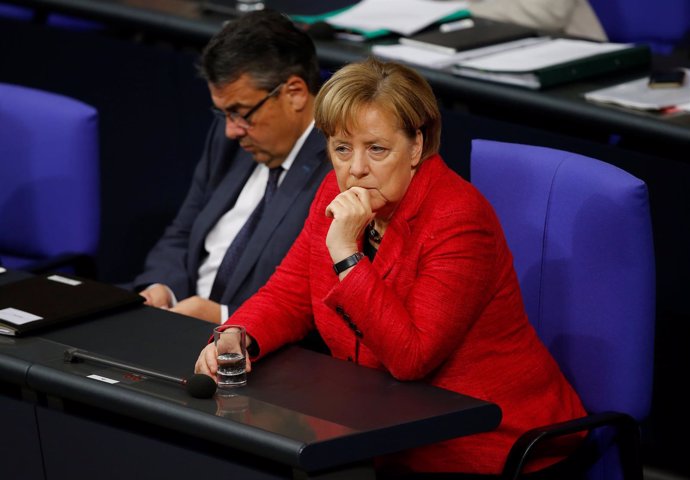 Sigmar Gabriel y Angela Merkel