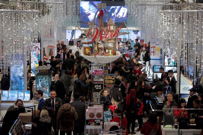 FILE PHOTO: People shop in Macy's Herald Square during early opening for the Bla
