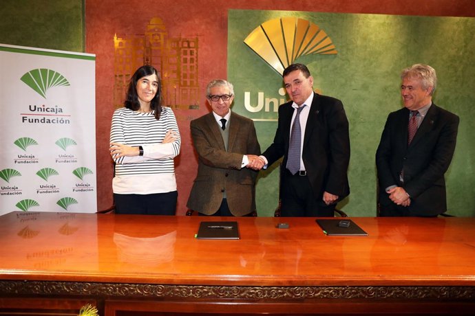 Braulio Medel con PEdro Luis Gomez AIOM cáncer secuenciador investigación