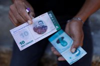 Un pequeño municipio de Caracas crea su propia moneda ante la escasez de bolívares