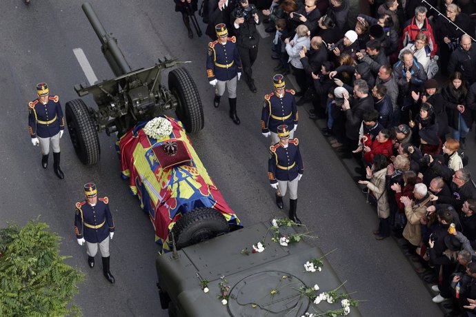 The coffin of late Romanian King Michael is carried during a funeral ceremony in
