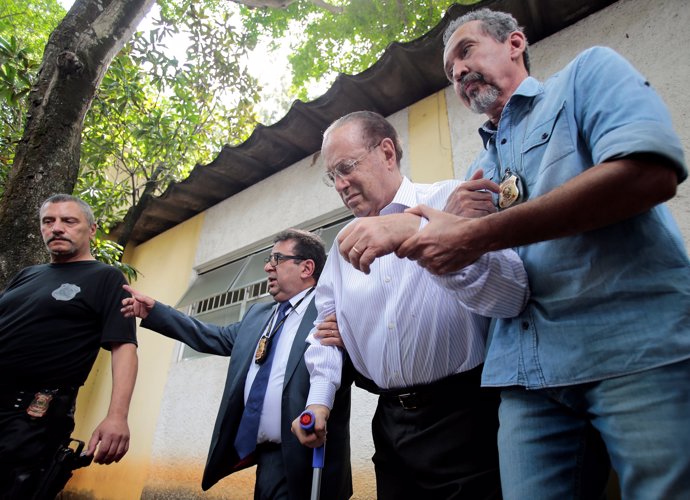 Member of Brazil's Lower House of Congress Paulo Maluf (2nd R) is escorted by Fe