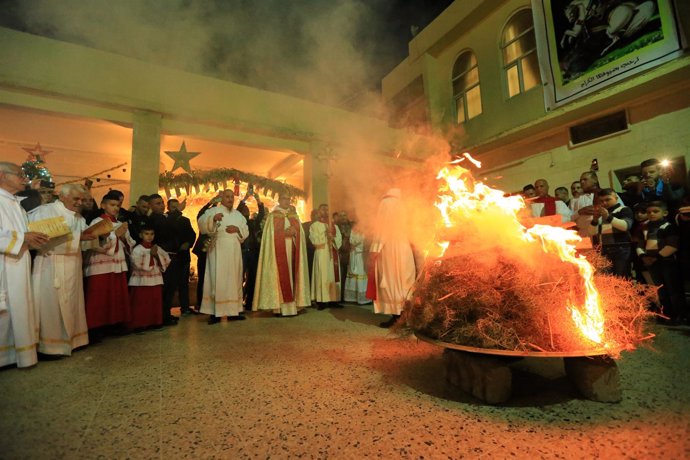 Critianos iraquíes celebran la Navidad en la Iglesia San Jorge