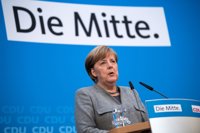 Los conservadores de Merkel y el SPD acuerdan iniciar las conversaciones para formar coalición