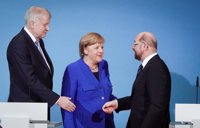 Merkel y Schulz defienden el pacto inicial para lograr un "Gobierno estable" en Alemania