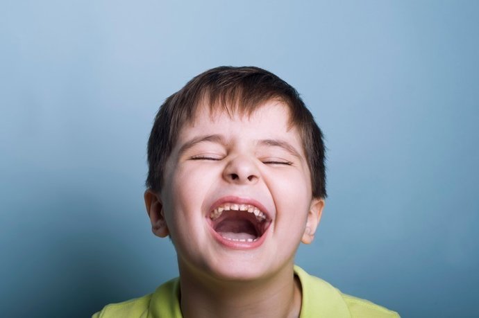 Niño riendo, risa