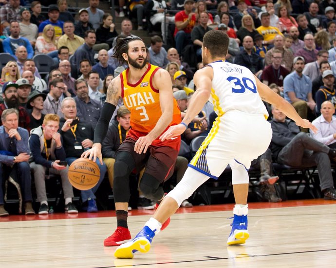 Ricky Rubio (Minnesota Timberwolves) y Stephen Curry (Golden State Warriors)