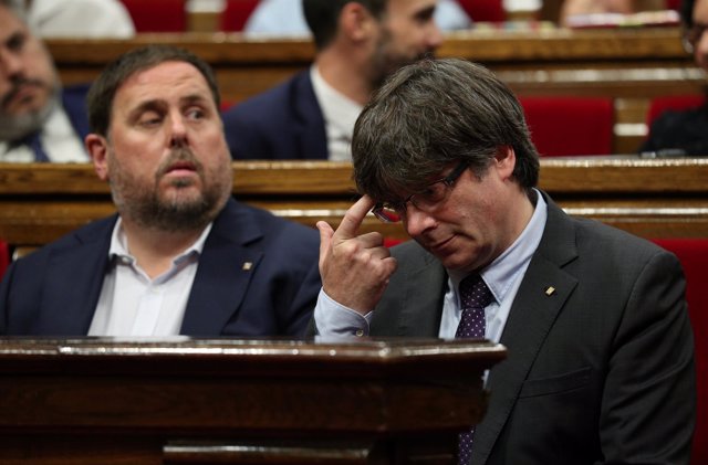 Carles Puigdemont y Junqueras
