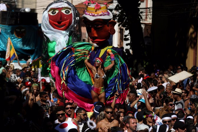 Revellers take part in the annual block party known as "Carmelitas", during carn