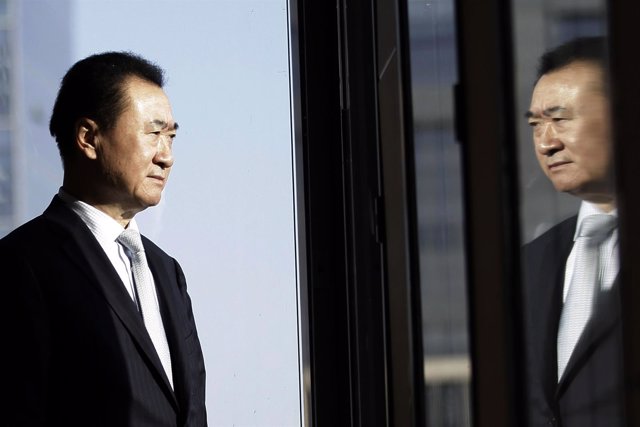 Wang Jianlin, chairman of Dalian Wanda Group, poses for a photo during an interv