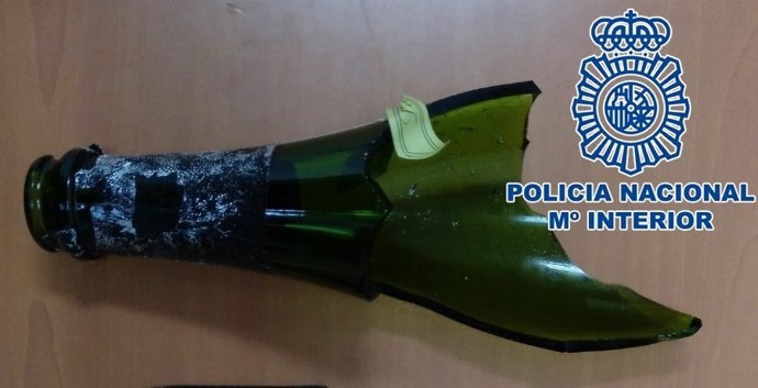 Botella rota utilizada en el atraco