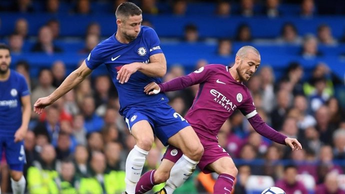 Cahill (Chelsea) y David Silva (Manchester City)