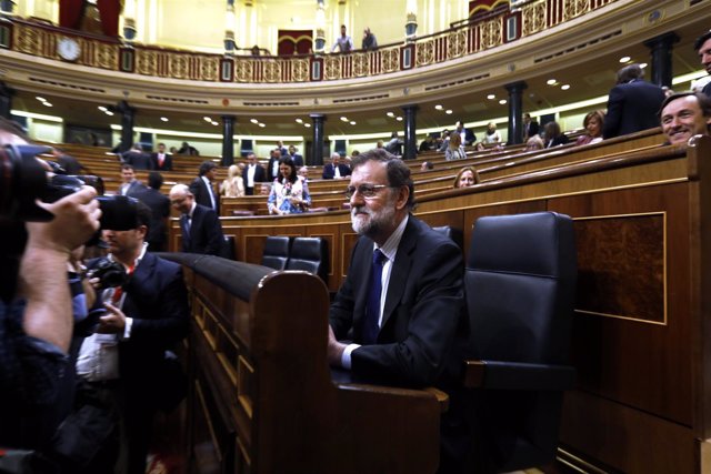 Mariano Rajoy, en su escaño ante los fotógrafos