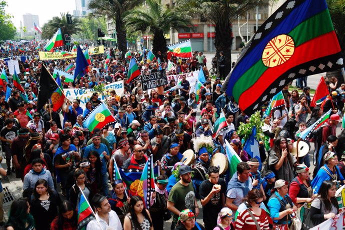 Mapuche Indian nad other activists take part in a rally against Columbus Day in 