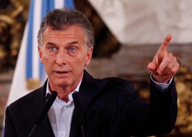 Argentina's President Mauricio Macri gestures during a news conference at the Ca