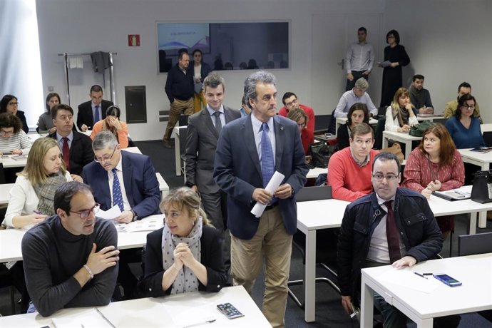 El consejero con los empresarios