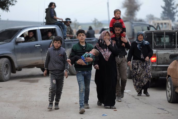 Familia de desplazados en Afrin