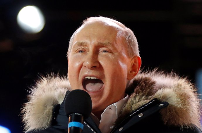 Russian President and Presidential candidate Vladimir Putin delivers a speech du