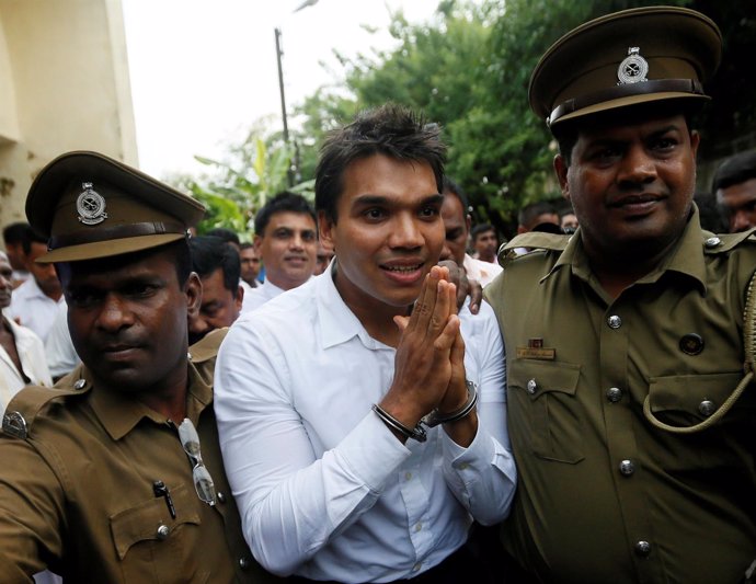 FILE PHOTO: Namal Rajapaksa (C), son of former Sri Lanka's President Mahinda Raj